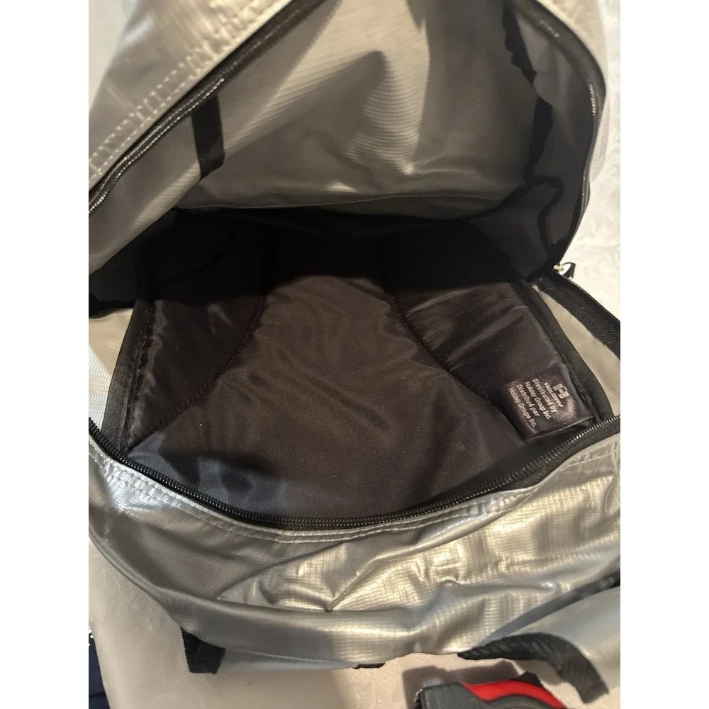 Ecko by Marc Ecko silver metallic backpack iconic black rhino logo front pocket